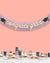 Graduation-themed banner with 'congrats grad' on a pink background, above a table with graduation-themed treats.