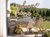 Decorative 'welcome home' sign in a garden setting with outdoor furniture and a teddy bear.