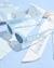 Sunglasses and sash with 'Bride' and 'Bride to be' text on a light blue background