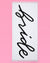 White towel with 'Bride' in black cursive text draped over a white railing outdoors.
