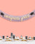Graduation-themed banner with 'congrats grad' on a pink background, above a table with graduation-themed treats.