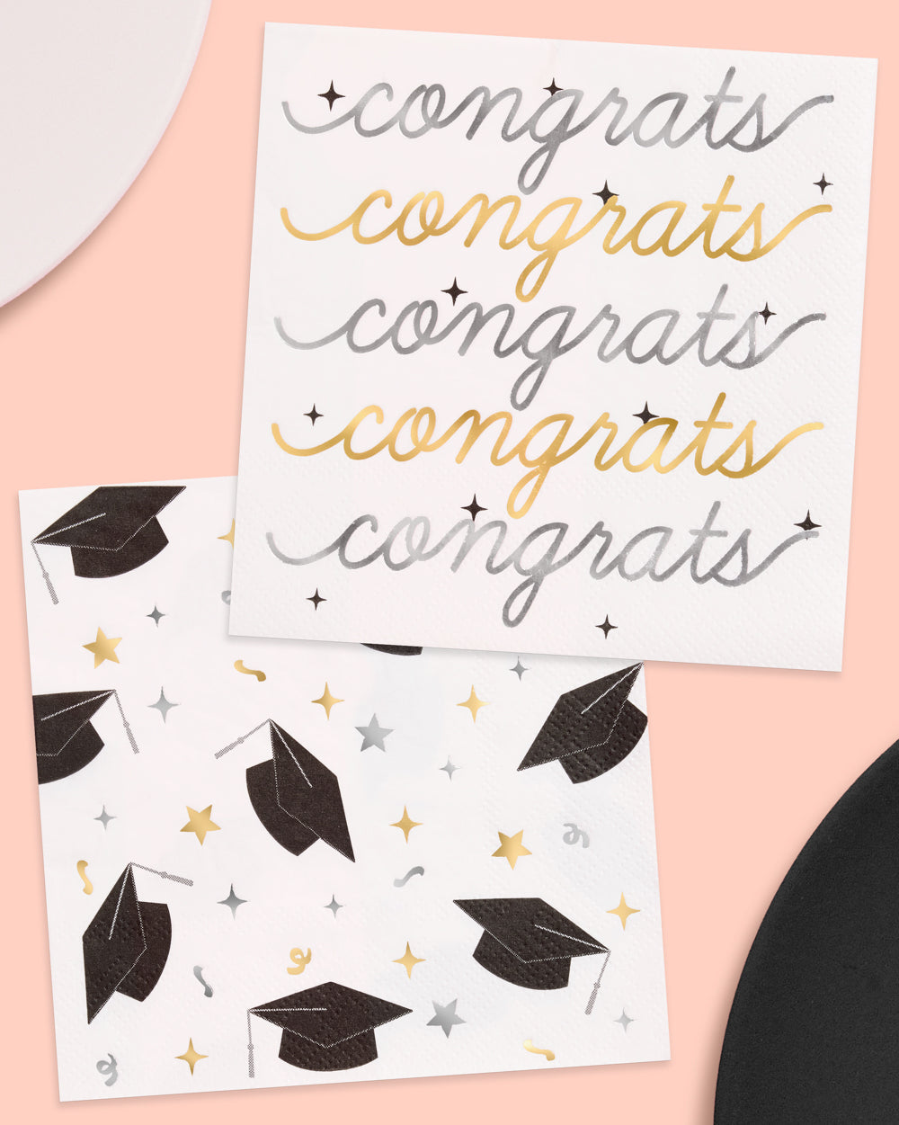 Graduation-themed cards with &#39;congrats&#39; text and caps on a pink background