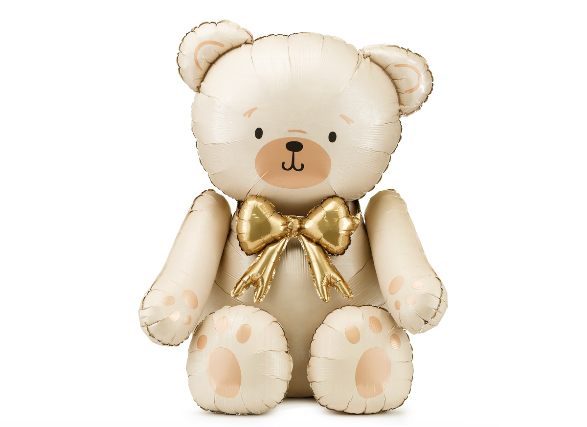 Plush teddy bear with a gold bow on a white background