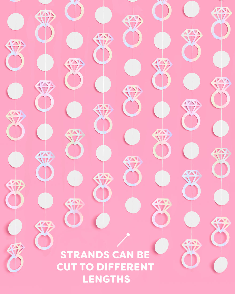 Decorative string with diamond ring and circle patterns on a pink background with table settings.