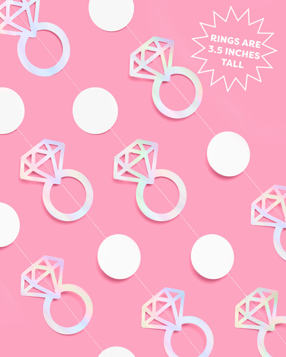 Decorative paper rings on a pink background with text indicating size.