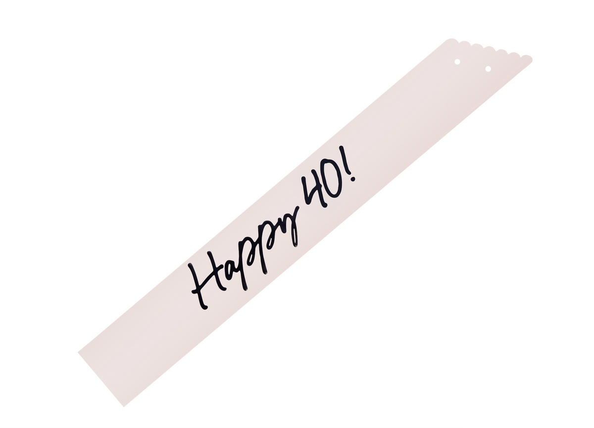 White sash with &#39;Happy 40!&#39; text on a white background
