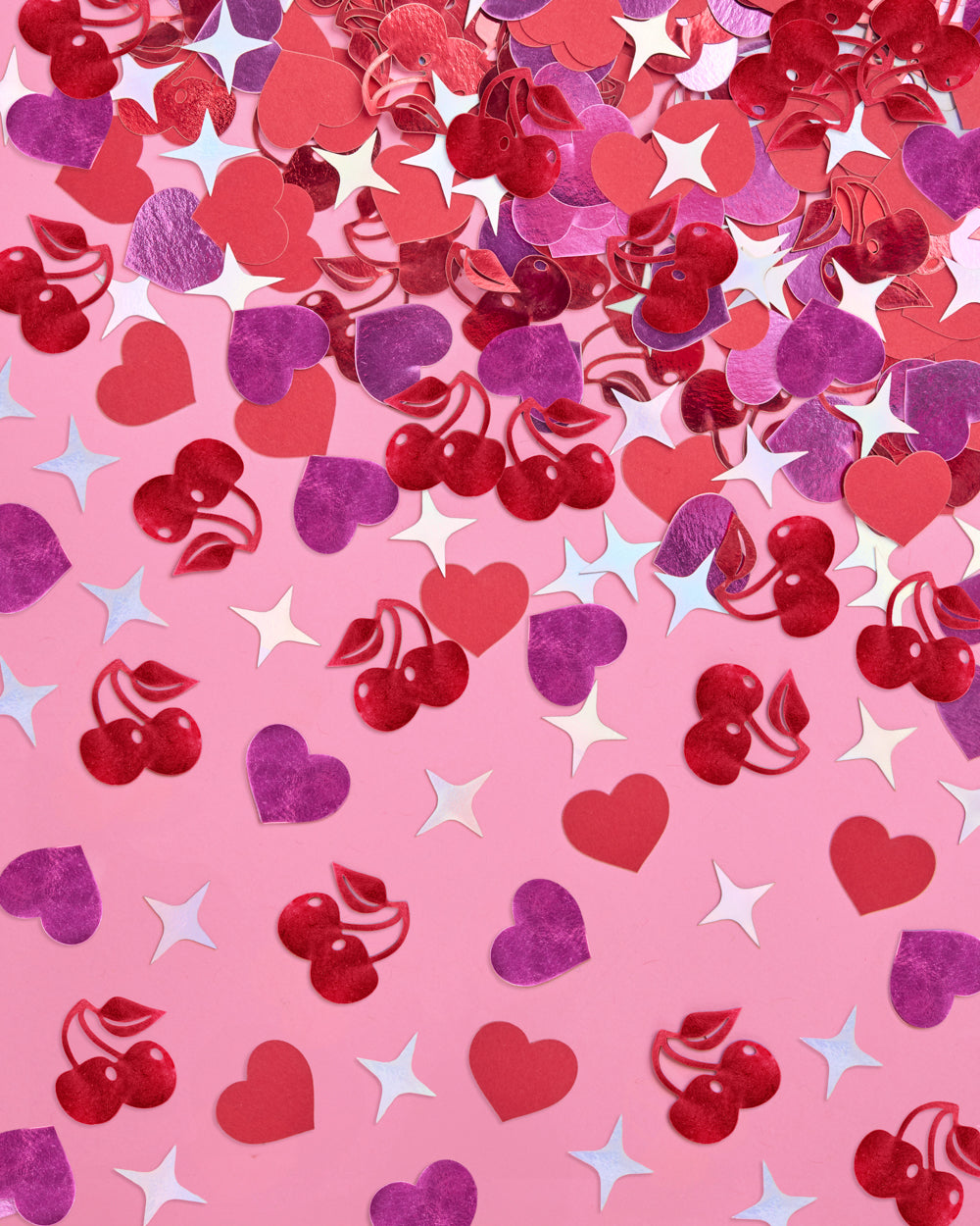 Colorful heart and cherry pattern on a pink background