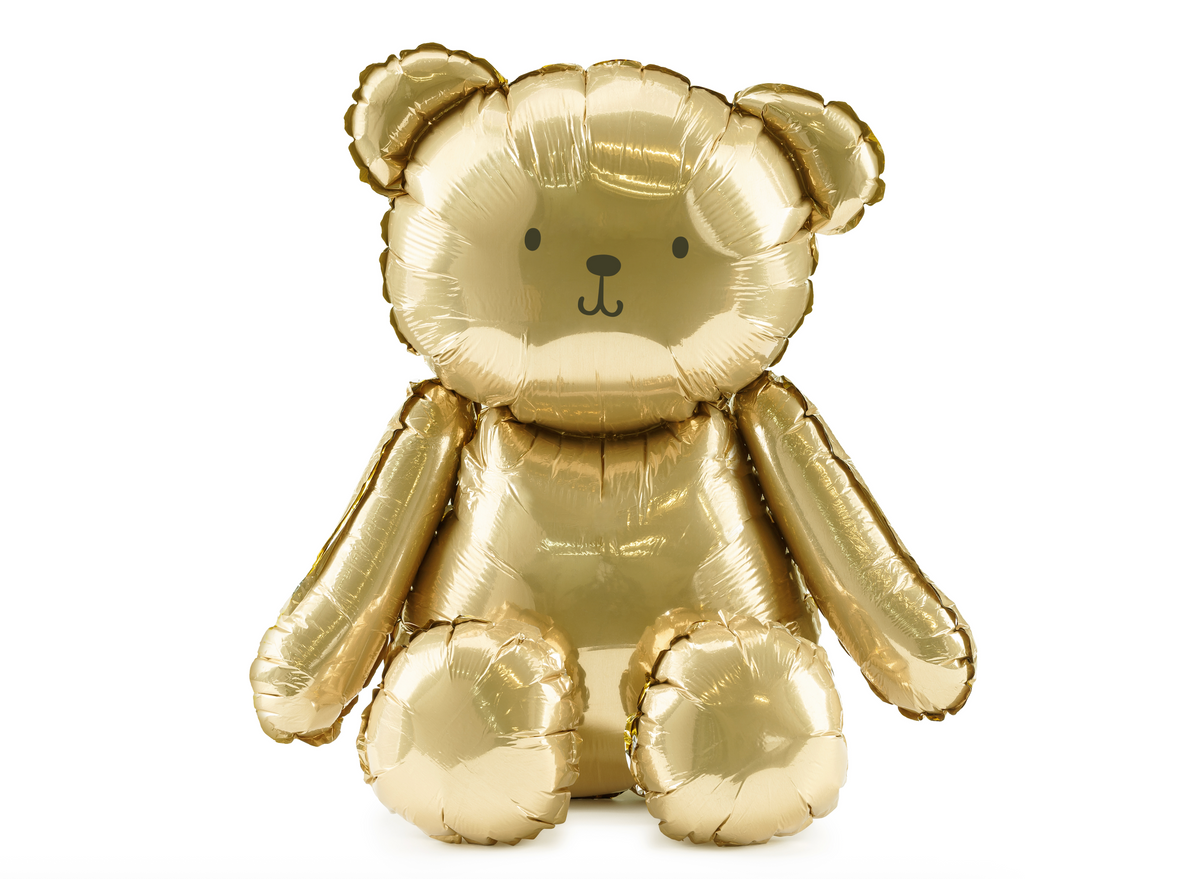 Gold teddy bear-shaped balloon on a white background