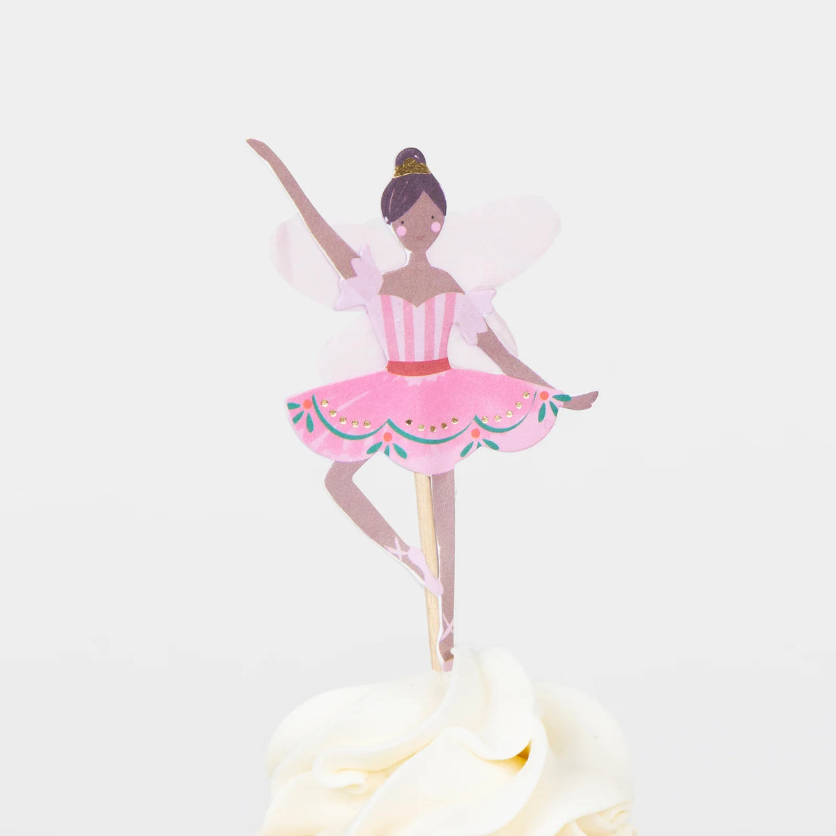 Ballerina cake topper on a white background