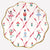 Decorative plate with ballet-themed design featuring dancers and bows on a white background.
