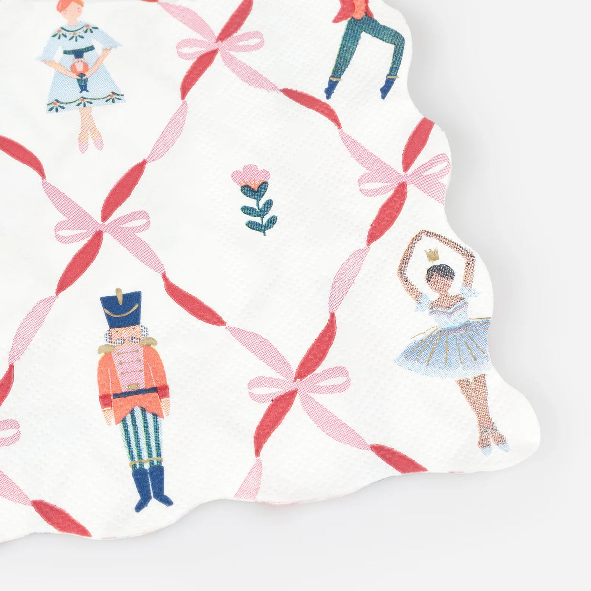 Pattern with Nutcracker characters and red ribbons on a white background