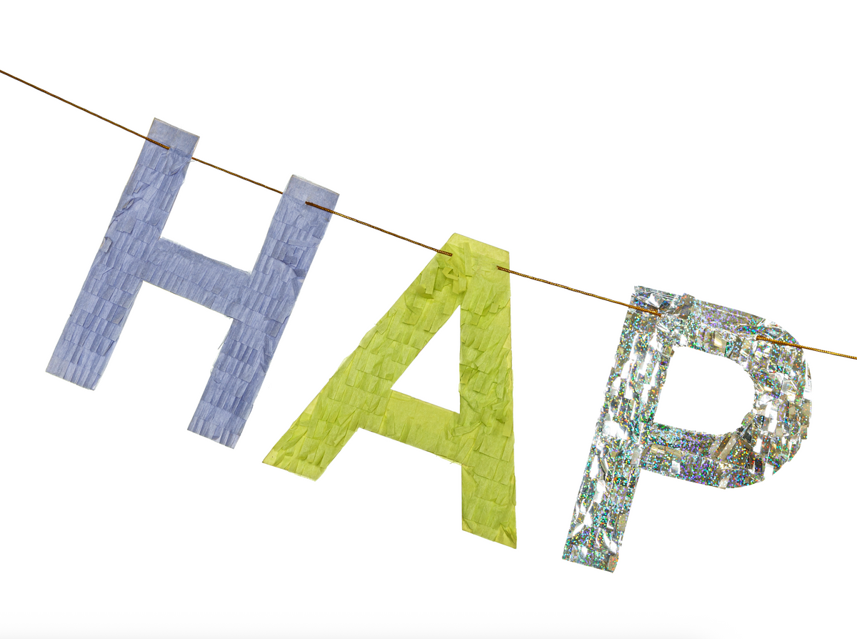 Decorative letters spelling &#39;HAPPY&#39; on a white background