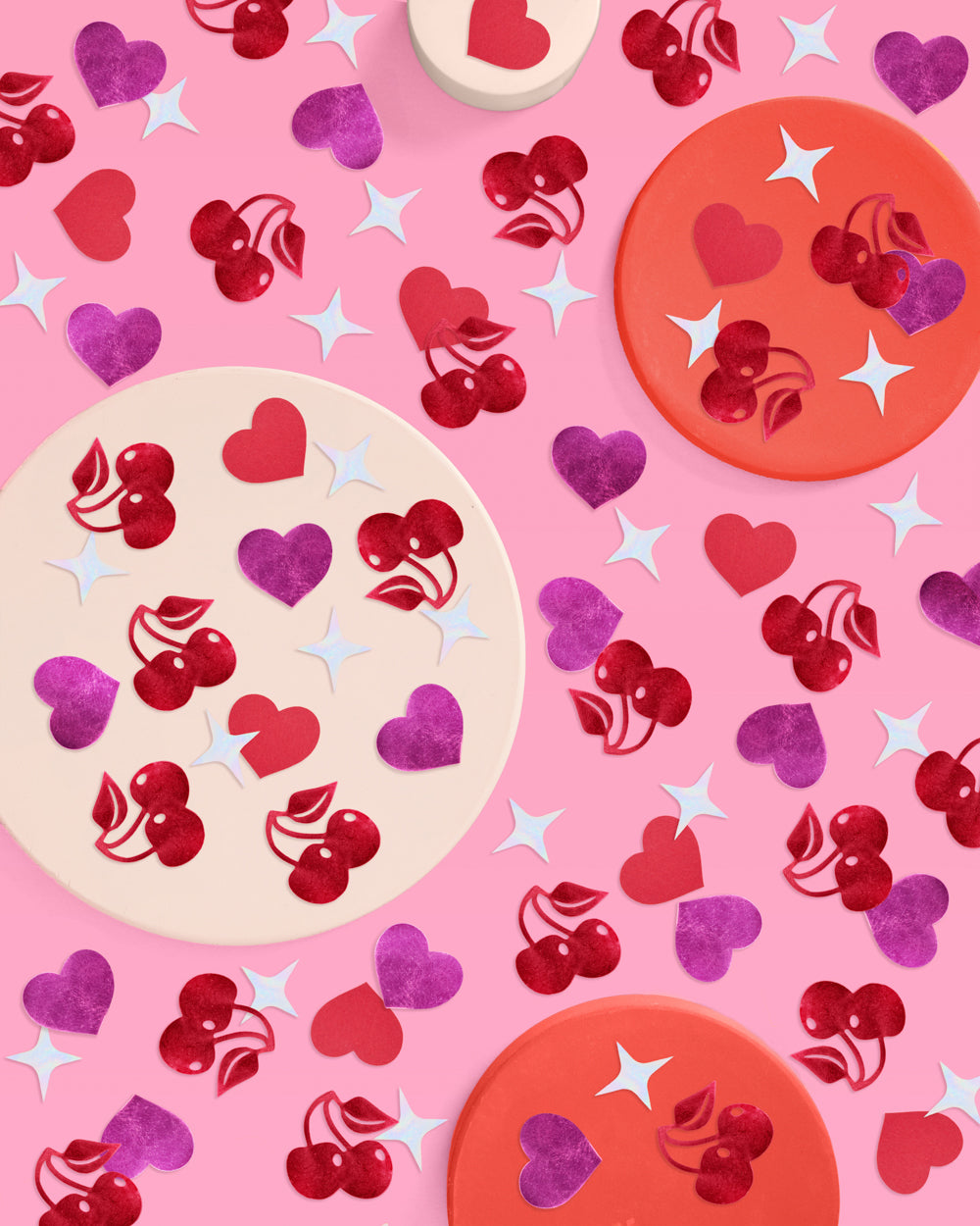 Decorative paper with heart and cherry designs on a pink background